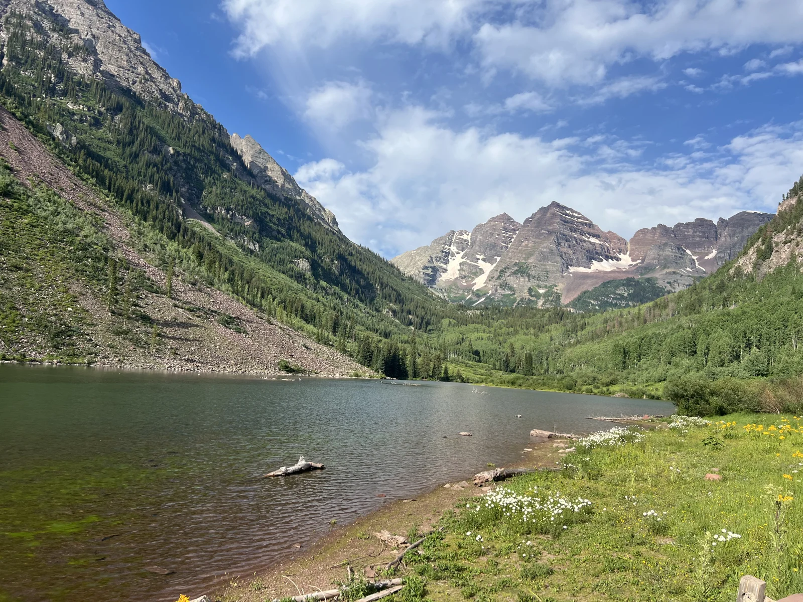 Maroon Lake in July with green slopes