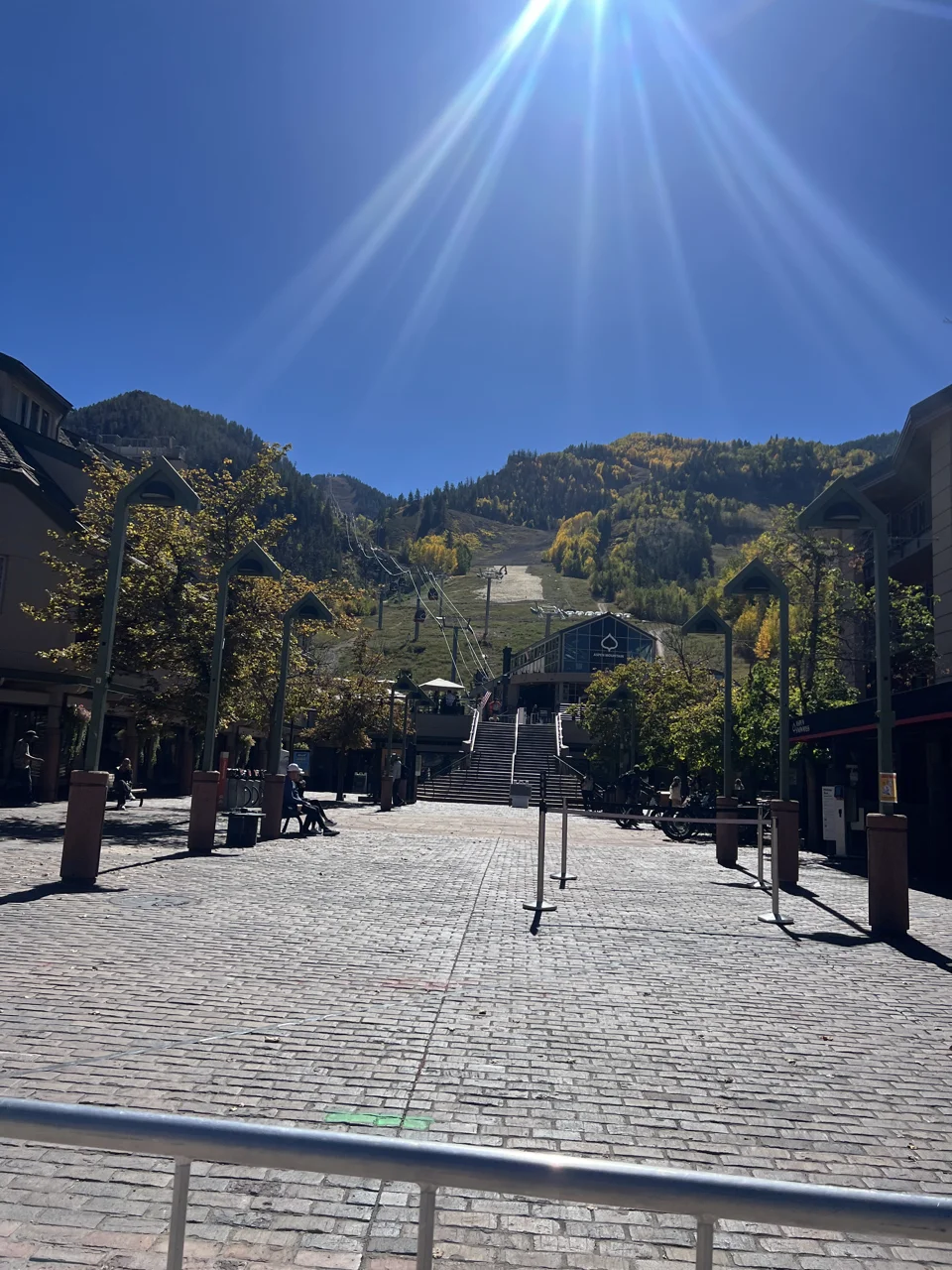 Silver Queen Gondola base in downtown Aspen with autumn color on Aspen Mountain
