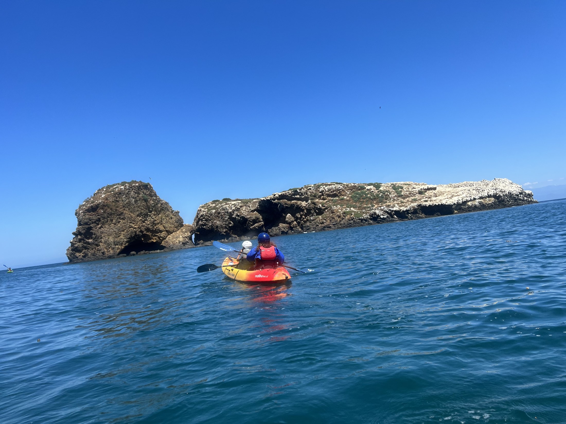 Guided sea kayaking near Scorpion Anchorage on Santa Cruz Island
