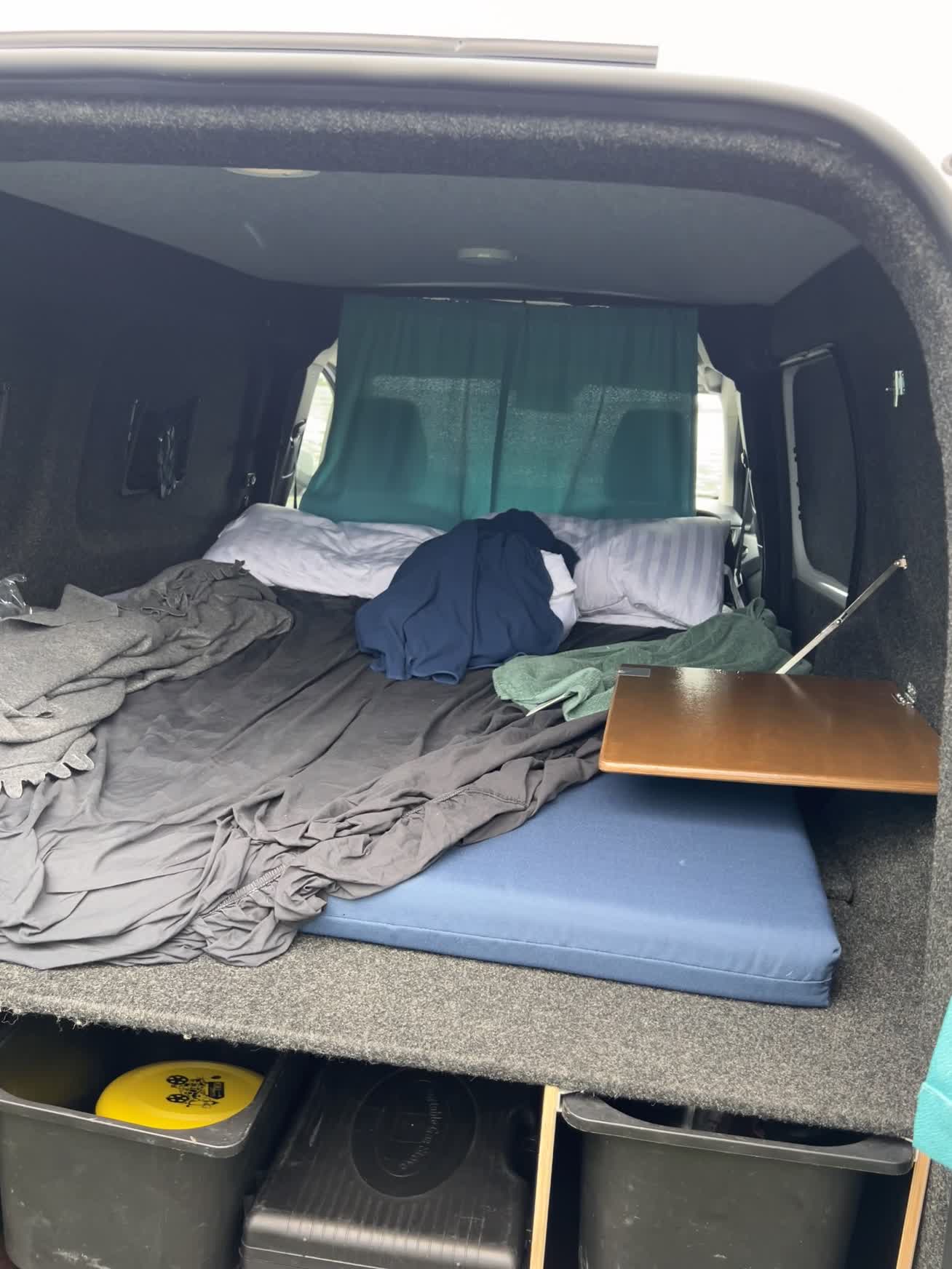 Sleeping setup inside our small Iceland campervan