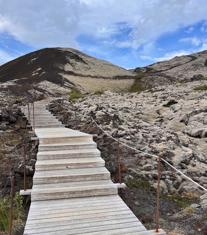 Wooden stairs climbing Grábrók crater