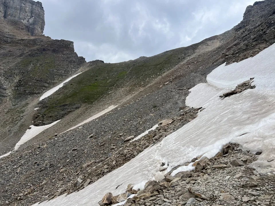 Lingering snow and ice crossing the upper Sentinel Pass trail in early August