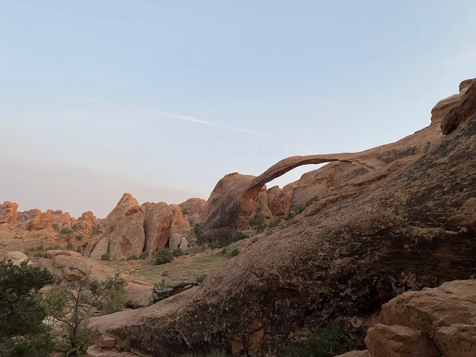 Sandstone arch and fins in Devils Garden at Arches National Park