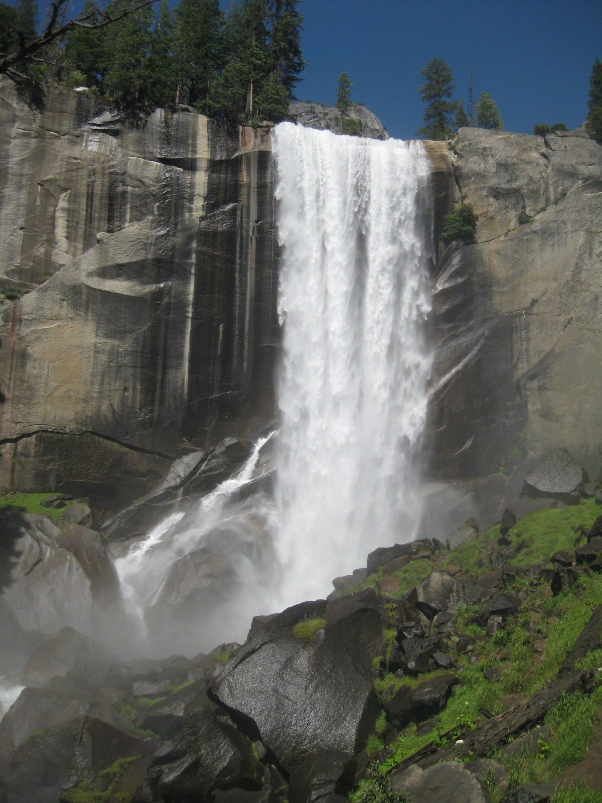 Vernal Fall pouring over a granite cliff in 2016